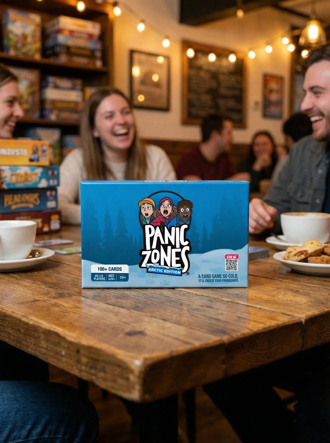 Friends playing a portable party card game during a house gathering
