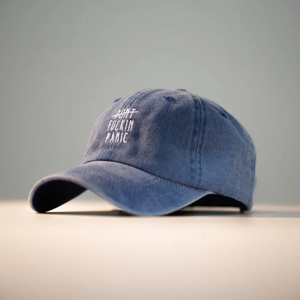 Panic Zones Don't F**** Panic Cap in blue — official Panic Zones merch