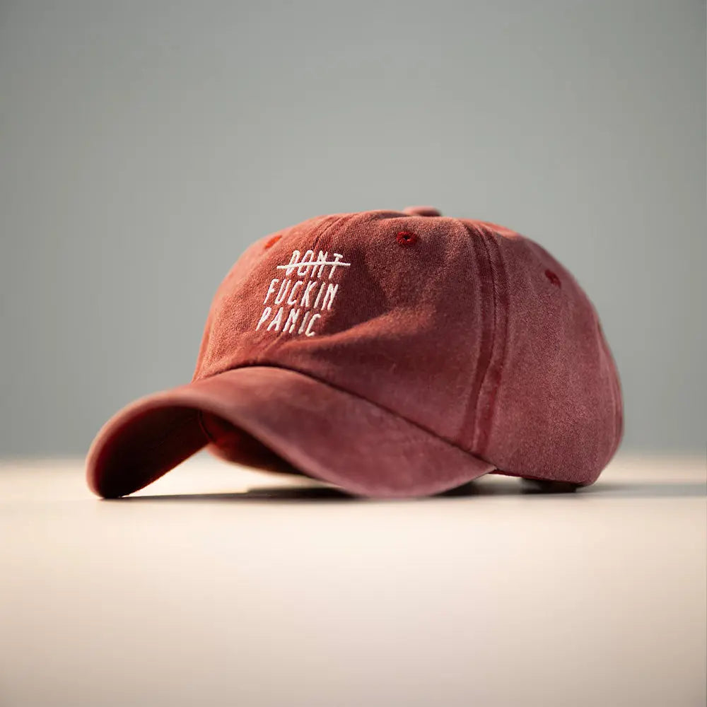 Panic Zones Don't F**** Panic Cap in red — official Panic Zones merch