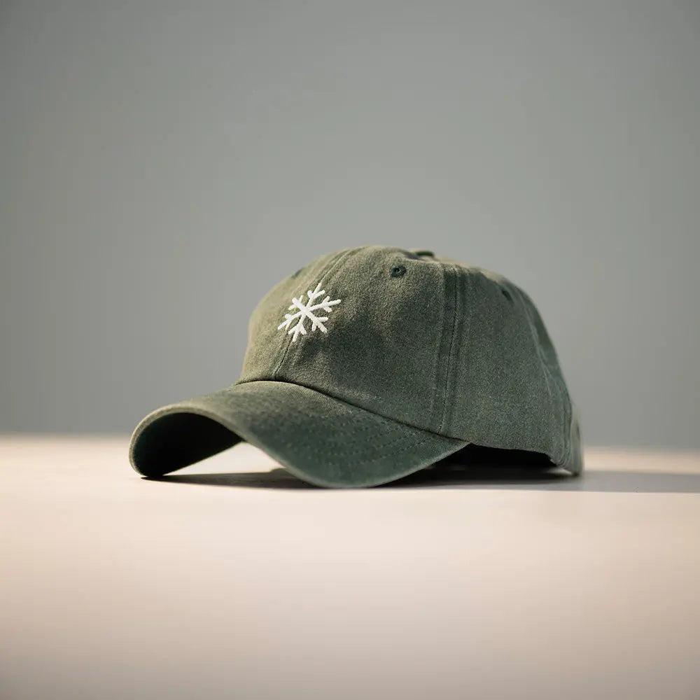 Panic Zones Snowflake Cap in green — official Panic Zones Arctic Edition merch